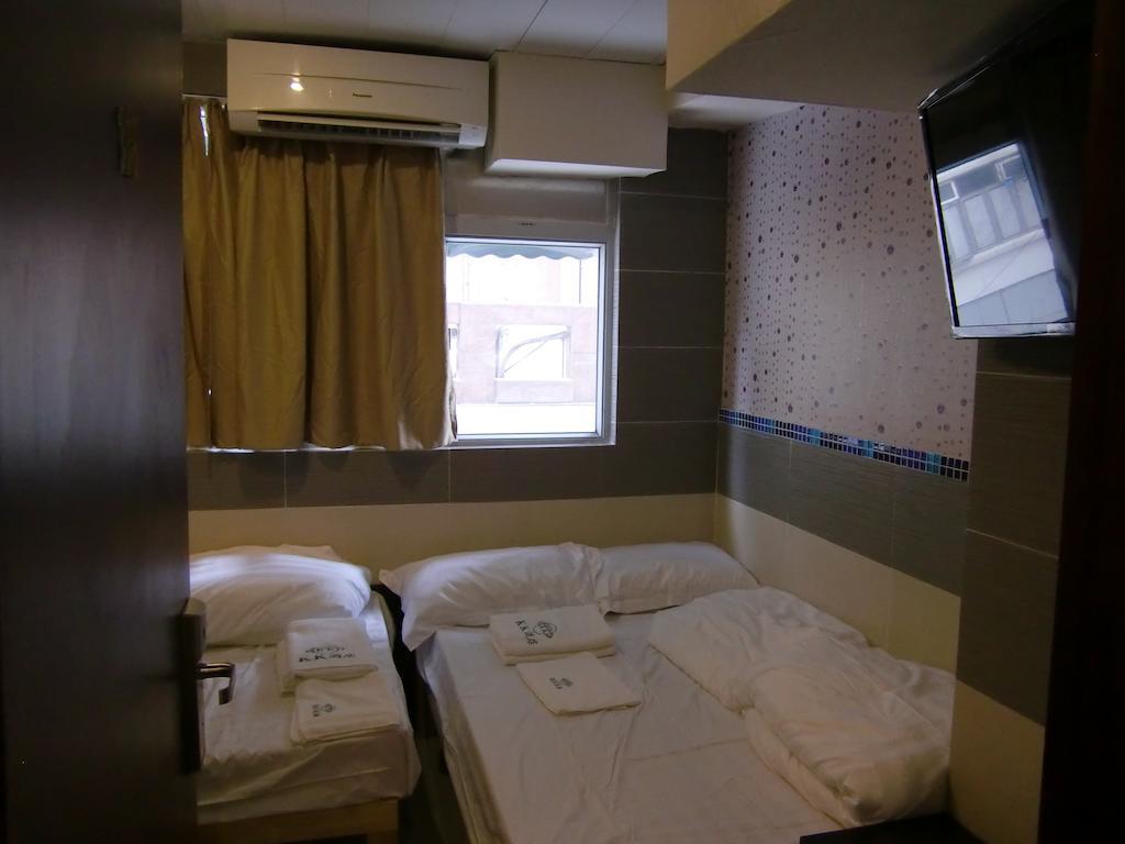 Kk Guesthouse Hongkong Kamer foto