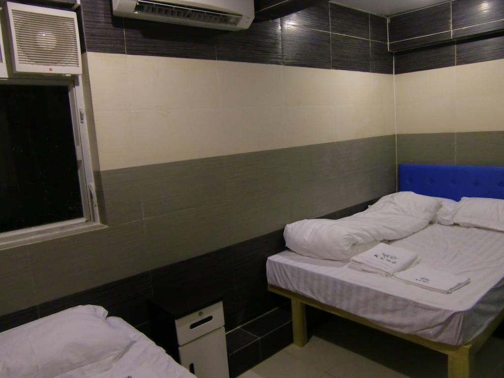 Kk Guesthouse Hongkong Kamer foto