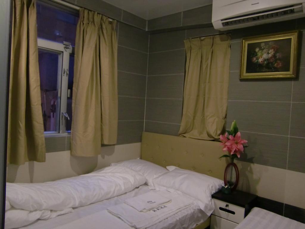 Kk Guesthouse Hongkong Kamer foto