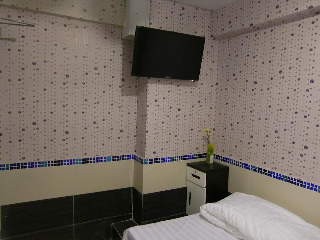 Kk Guesthouse Hongkong Kamer foto